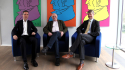 Foto: Dr. Martin Klein, Dr. Kai Zentara und Michael Löher sitzen nebeneinander auf Sesseln